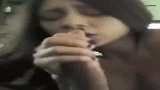 Tattooed brunette chick strips down and sucks a ha...