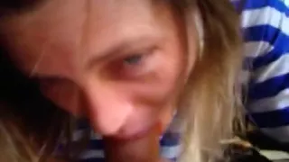 Blonde bitch takes big cock in her hand and sucks it like hell