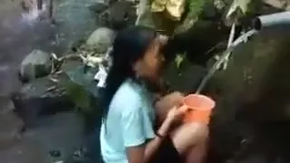 Indonesia girl outdoor nature shower