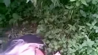 Russian streetslut sucks a guy with condom in nature