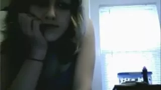 Small titted brunette girl fingers her shaved pussy on her bed