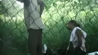 Voyeur tapes a black girl couple having sex on bench in the park
