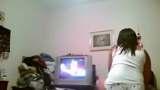 Voyeur tapes a chubby brunette girl with tanlines putting on clothes in her bedroom