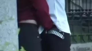 Voyeur tapes a girl couple making-out in public, while masturbating eachother.