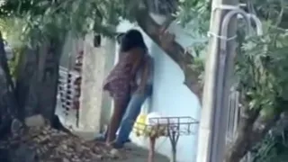 Voyeur tapes a horny latin couple having sex on the pavement