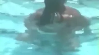 Voyeur tapes a latin couple fucking in the swimming pool