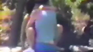 Voyeur tapes a mature couple having missionary sex on some rocks in nature