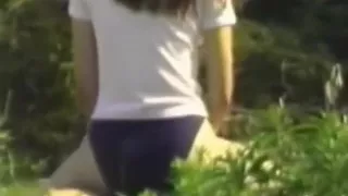 voyeur tapes a norwegian ponytailed brunette girl riding her boyfriend  in public on a music festival