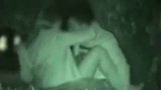 Voyeur tapes a partygirl riding a guy in the park