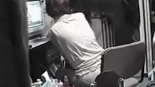 Voyeur tapes an asian girl masturbating on porn on her pc