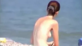Voyeur tapes girls at a nude beach