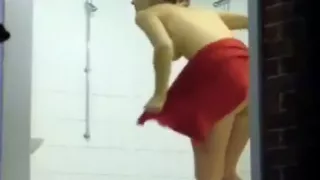 Voyeur tapes lots of students showering in the girls' lockerroom