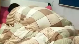 Homemade clip with an amateur Asian couple making love indoors