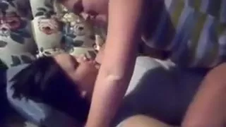 Homemade video with two cute lesbians making out on a sofa