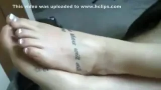 my sexy tattooed girlfriend  favours me with a passionate footjob