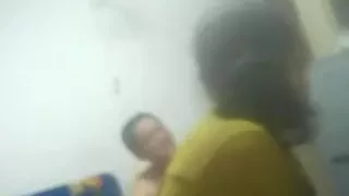 Chanese woman shows tits and pussy with husband in back