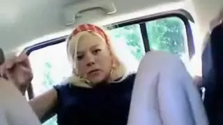 Scandinavian yellow haired in her car