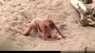 Nasty pair fucking on the beach
