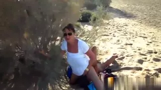 Pose 69 with stranger on the beach