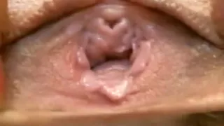 Closeup of hotty playing with her snatch