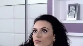 Shaggy haired dark brown girl of dildoing