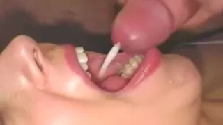 Filling her throat with cum