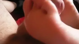 Footjob for his hard boner