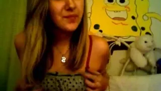 Sexy girl showing her tits and fingering pussy on web cam