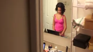 Stunning brunette in the bathroom