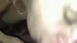 Using her lips and tits to please