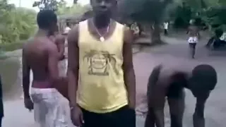 African sex in public. his buddies sing and cheer for him !!!