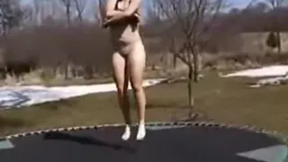 american brunette girl has sex with her boyfriend  on a trampoline