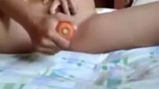 Asian girl loses her virginity to a huge carrot !!!