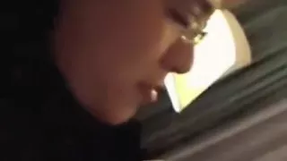 asian girl with hairy pussy takes a shower and gives her nerdy boyfriend  a blowjob on the bed in a hotelroom