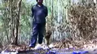 Asian girls get busted fucking in the forest and make a run for it