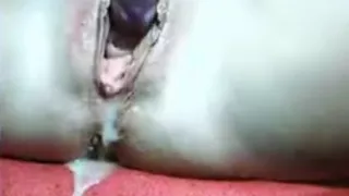 blonde american girl plays with her big boobs, masturbates and squirts pussyjuice, while her boyfriend  is hazard in the back.