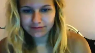 blonde girl satisfies her boyfriend  on cam by showing herself naked and masturbating with her small vibrator