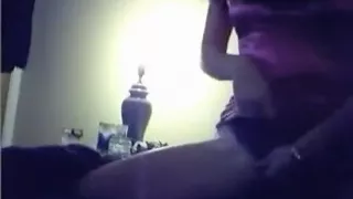 brunette girl teases her boyfriend  in the bedroom by playing with her big boobs and shaved pussy