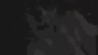 Brunette girl with small tattooed tits masturbates her shaved pussy with a vibrator on her bed