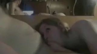 Brunette gives her chubby nerdy husband a blowjob