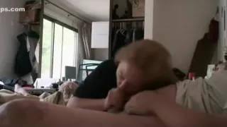 Brunette milf gives her fat nerdy glassed husband a blowjob with cum swallowing on the bed