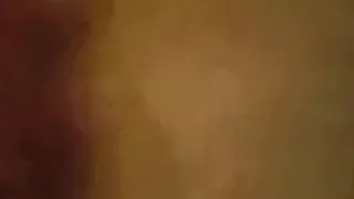 Brunette slut sucks cock, while getting doggystyle fucked in a threesome.