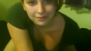 Chubbt girl rubs her trimmed pussy on her bed