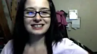 Chubby nerdy girl flashes her tits and rubs her pussy on a chair