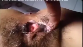 Closeup view of a hair asian pussy getting fingered, missionary fucked and creampied.