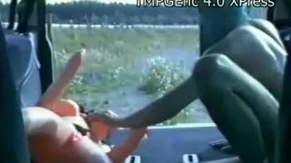 Crazy guy fucks a plastic doll in the back of his car