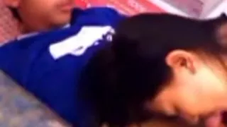 cute asian girl makes-out with her boyfriend  and gives him a blowjob