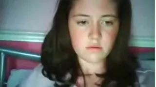 cute brunette girl has cybersex with her boyfriend  and masturbates with a toy