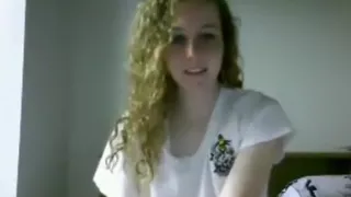 cute girl with curly hair has cybersex with her boyfriend 