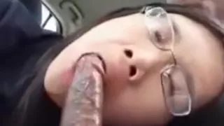 cute nerdy asian american girl sucks off her black boyfriend  in his car
